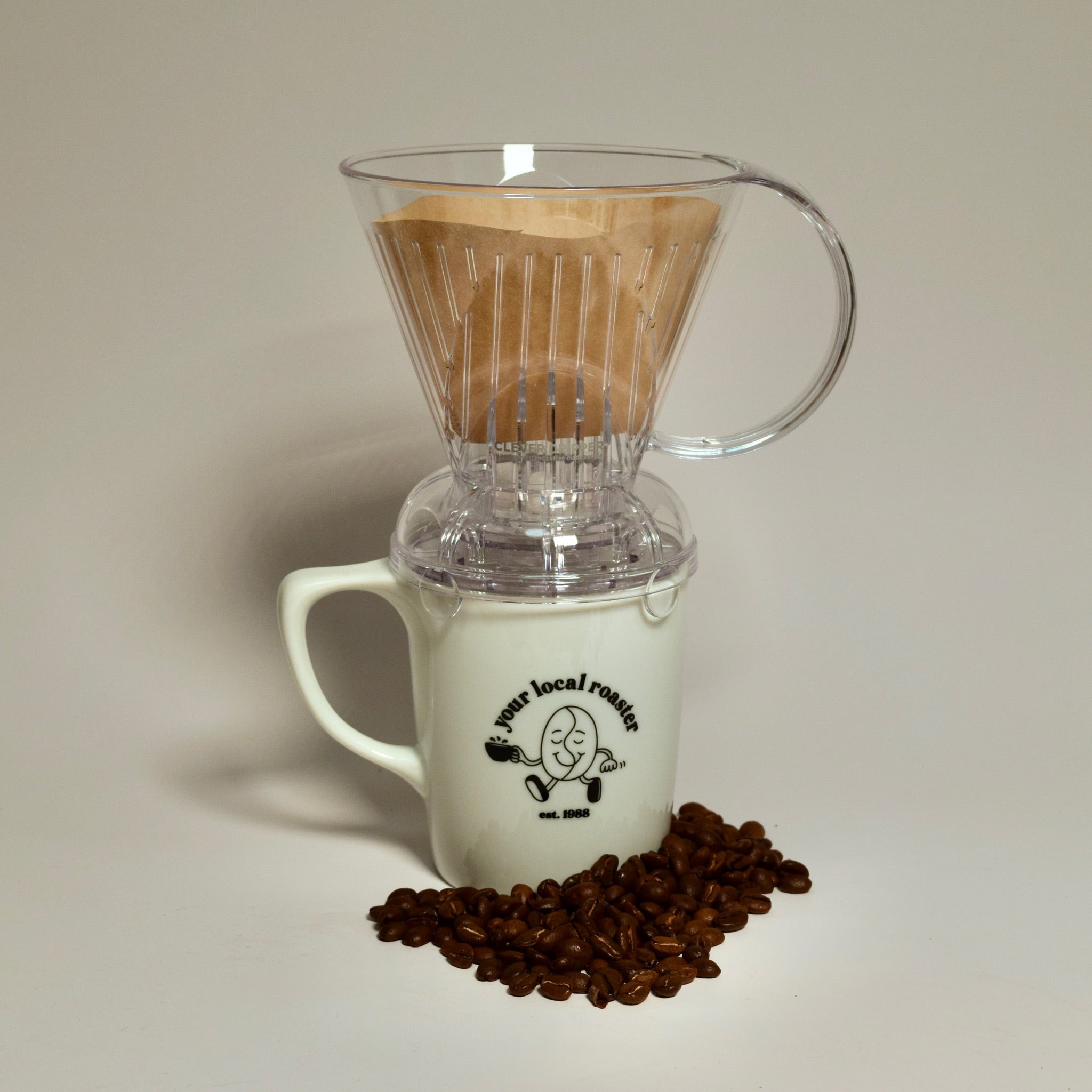 Clever Dripper coffee brewer with paper filter on mug for immersion brewing