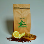 Bag of Ethiopia Yirgacheffe coffee with lemon and floral flavour props arranged beside it