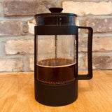 French press brewing method showing rich, full-bodied coffee extraction